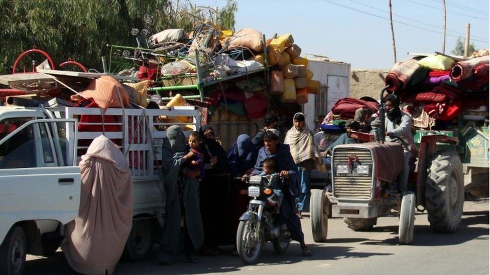 Afghans flee their villages after fighting intensified between Taliban militants and security forces, in Lashkargah, the provincial capital of restive Helmand province, Afghanistan, 12 October 2020.
