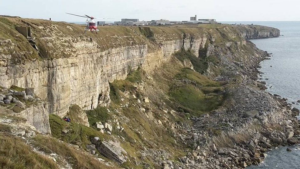The coastguard helicopter during the rescue at Blacknor