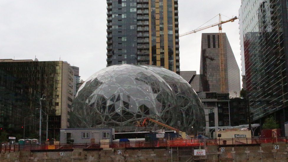 Online retail powerhouse Amazon is constructing an eye-catching Spheres office building to feature waterfalls, tropical gardens and other links to nature as part of its urban campus on May 11, 2017 in downtown Seattle, Washington.