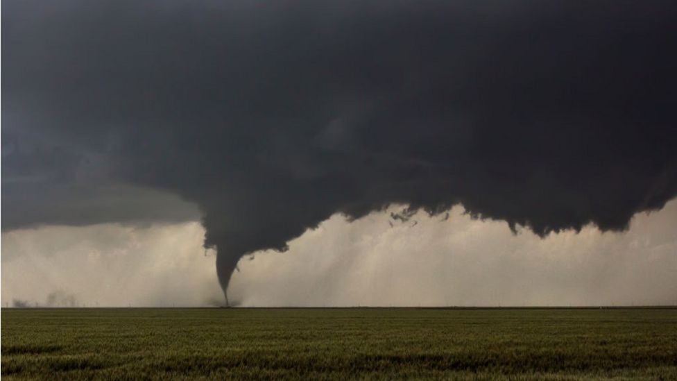 Tornadoes tear through US south, killing three - BBC News