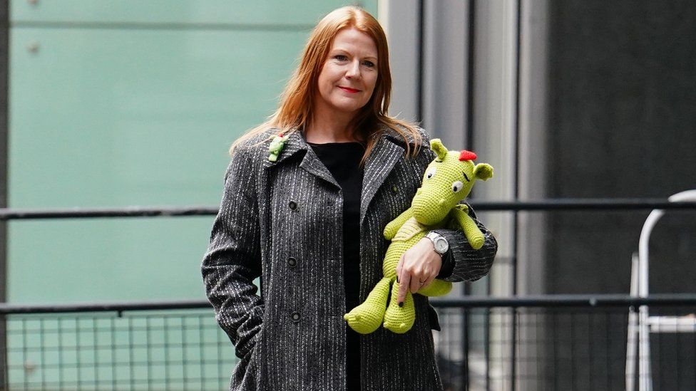 Author Fay Evans outside The Rolls Building in London in January 2023. Ms Evans who claimed John Lewis had infringed her copyright in its Christmas advert about an excitable dragon has lost her High Court case