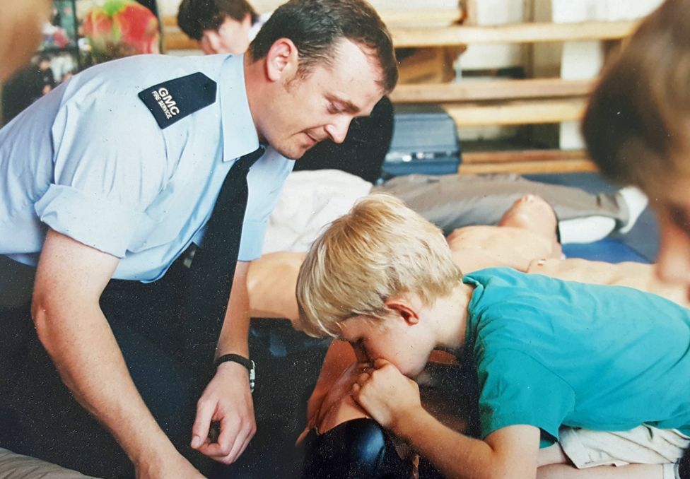 Phil Murphy teaching school children CPR