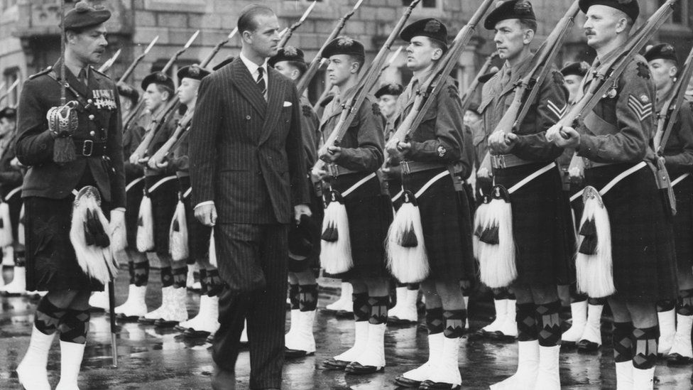 The Duke of Edinburgh inspecting a Guard of Honour of the 2nd Battalion Black Watch, at Ballater Station on the way to Balmoral in August 1952