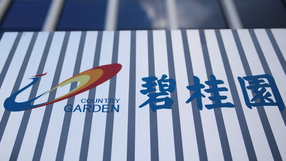 The company logo of Chinese developer Country Garden is pictured at the Shanghai Country Garden Center in Shanghai.