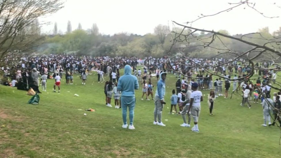 People gathered at Holders Lane playing fields in Moseley, Birmingham