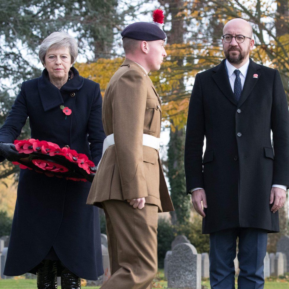 Theresa May and Belgium's Prime Minister Charles Michel at a ceremony at Mons
