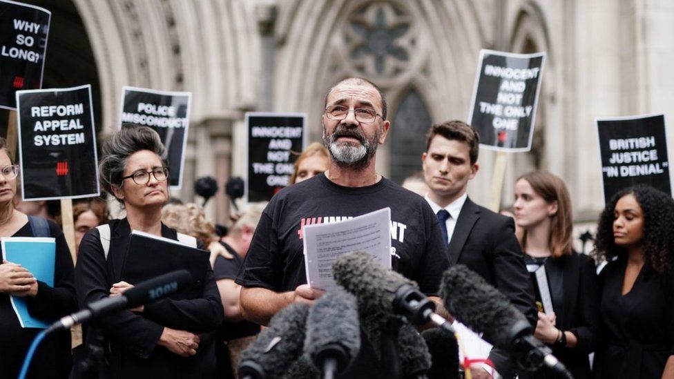 Andrew Malkinson, reads a statement outside the Royal Courts of Justice in London, after being cleared by the Court of Appeal