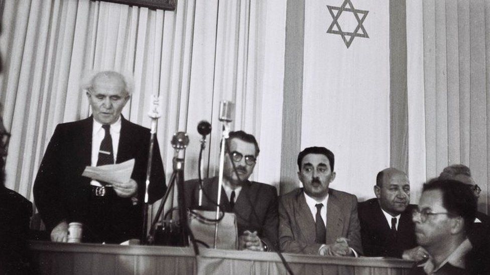 David Ben-Gurion (left) reads the Israeli Declaration of Independence on 14 May 1948