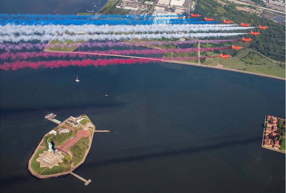The Red Arrows fly over the Statue of Liberty in New York City
