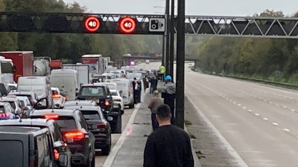 Traffic builds up as Just Stop Oil stage a protest at junction 7 of the M25