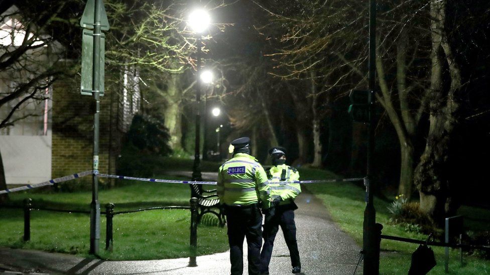 Metropolitan police cordon at The Rope Walk in Sandwich, Kent, after a body found hidden in woodland in Ashford