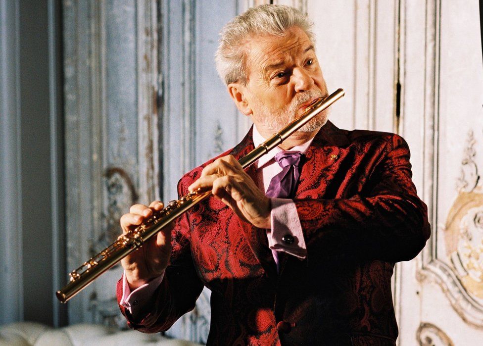 Sir James Galway plays the flute