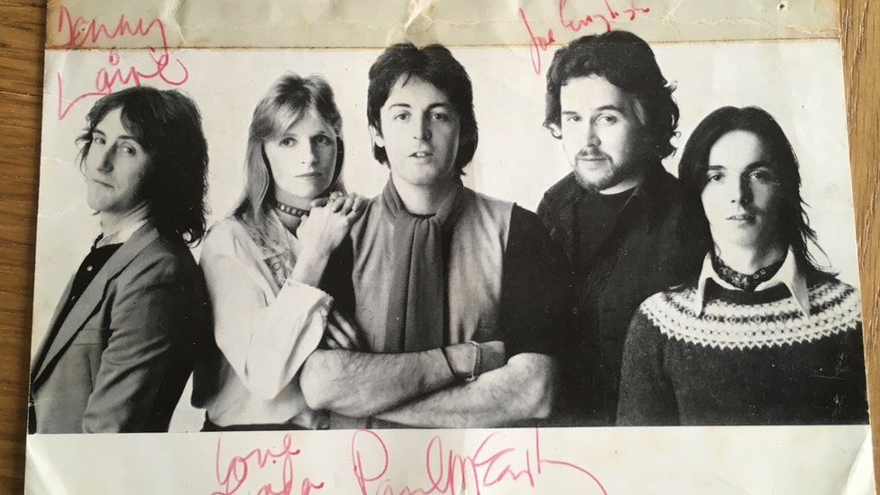 A signed photo of the band Wings