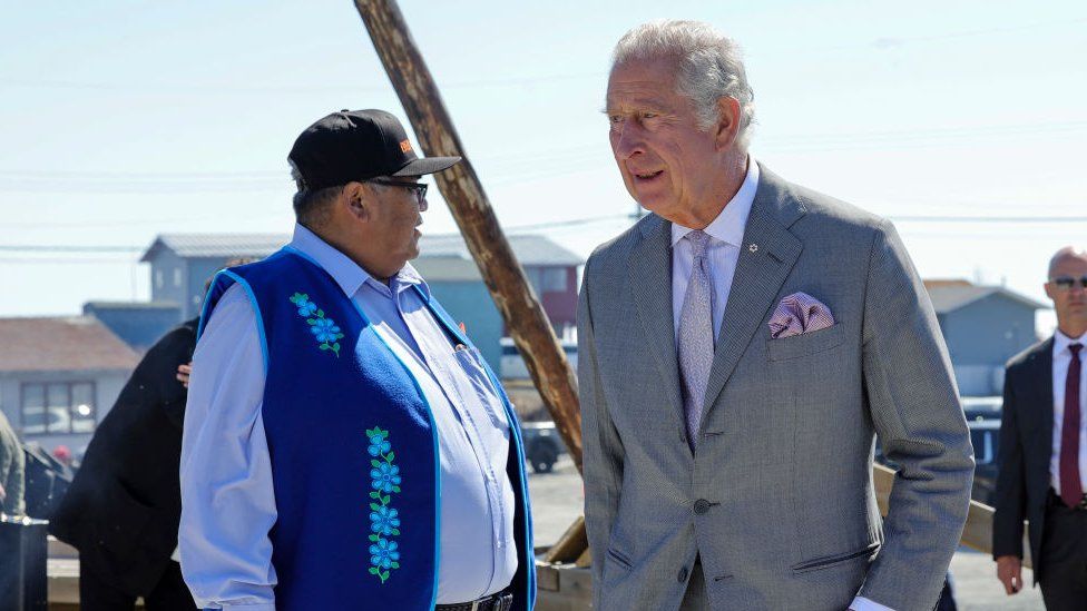 Prince Charles, Prince of Wales and Chief Edward Sangris (Dettah) participate in a Feeding the Fire Ceremony, facilitated by Elder Bernadette Martin on day three of their Platinum Jubilee Royal Tour