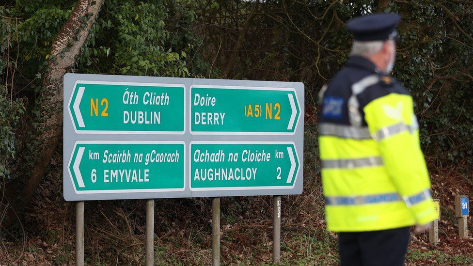 Garda stop vehicles at a checkpoint on the Irish border between Emyvale and Aughnacloy on 8 February 2021