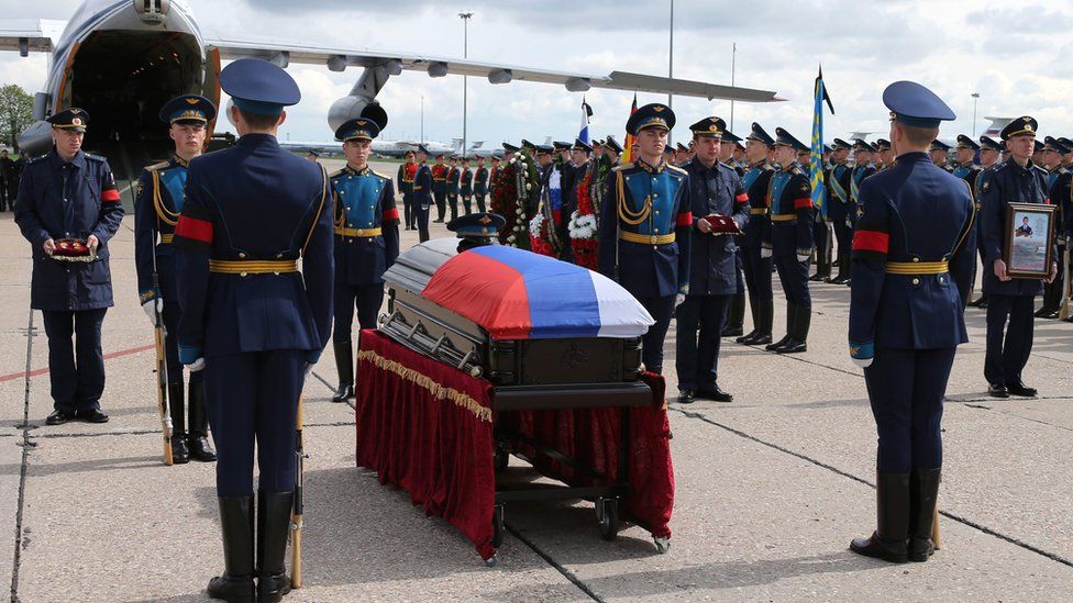 russian soldier war hero with a flag against the