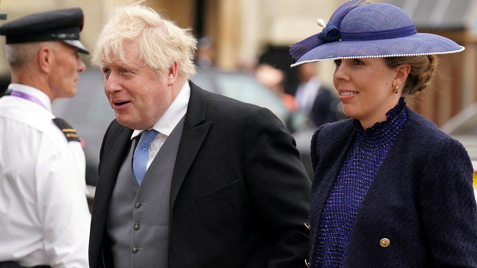 former premier  curate  Boris Johnson and his woman  Carrie Johnson arriving astatine  coronation ceremonial  of King Charles III