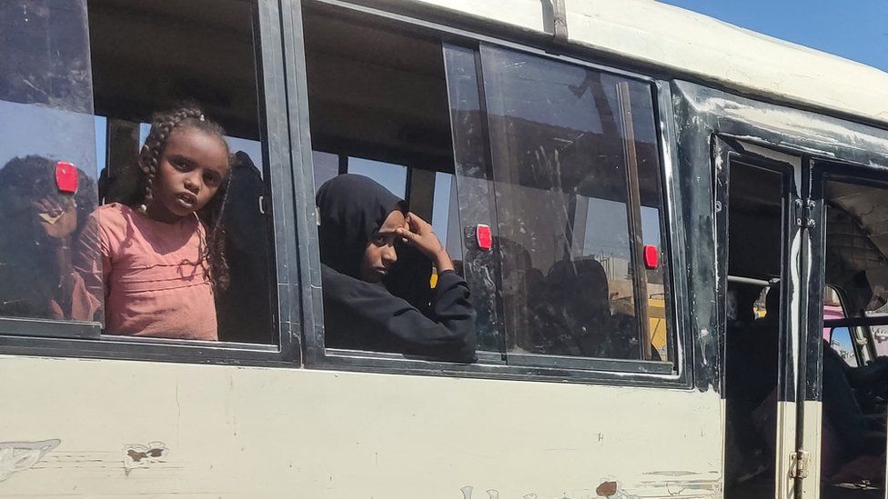 Displaced people fleeing from Wad Madani in Sudan's Jazira state arrive in Gedaref in the country's east.