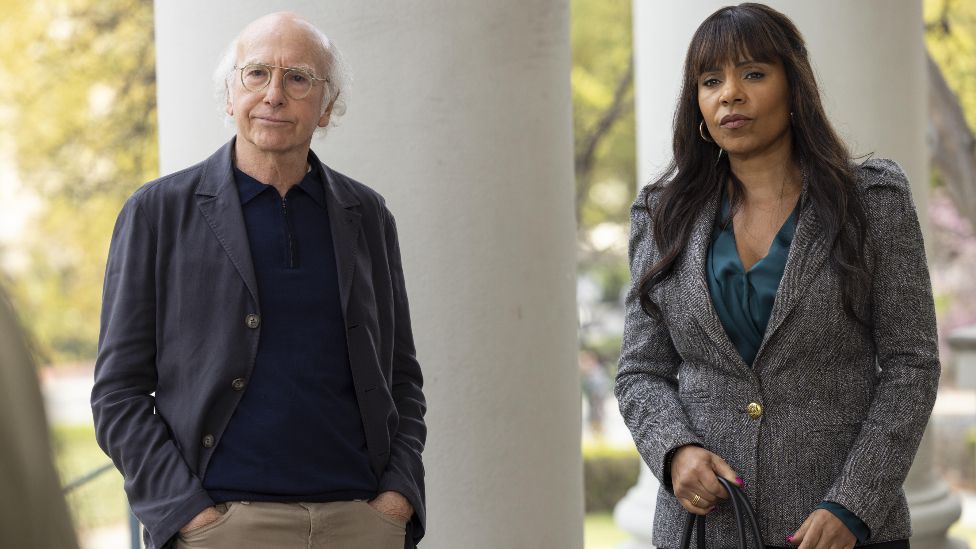 Larry David as himself and Sanaa Lathan as Sibby Sanders in Curb Your Enthusiasm