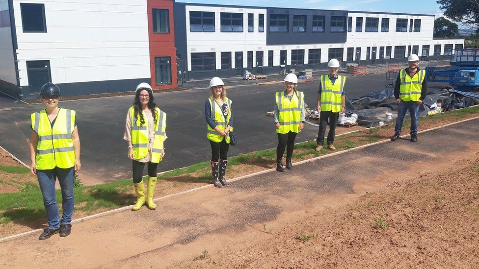 Teaching Staff Standing Outside The New Isambard Kingdom Brunel Primary School In Wellington