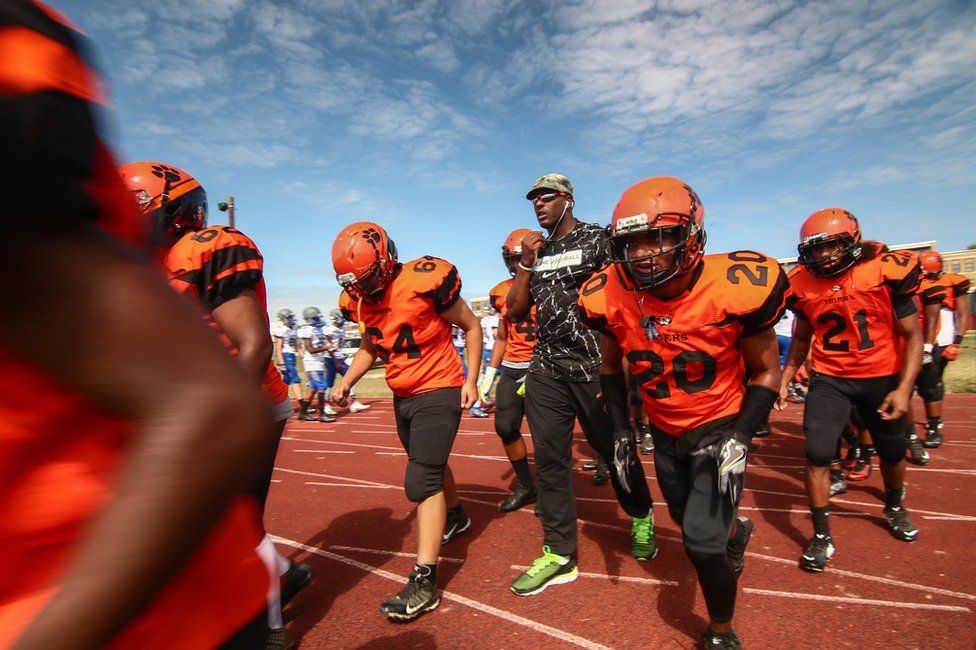 Tigers rush out onto the field