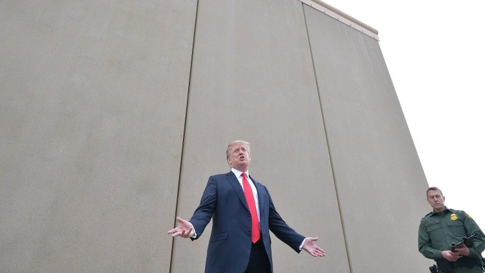 US President Donald Trump inspects border wall prototypes with Chief Patrol Agent Rodney Scott in San Diego, California