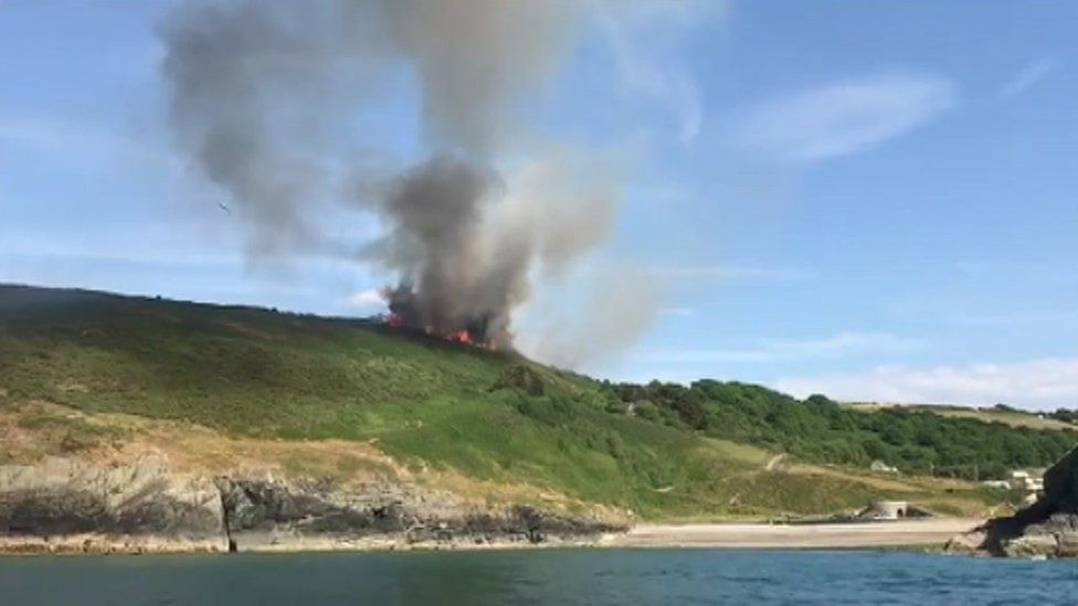 Fire on a hillside over Cwmtydu