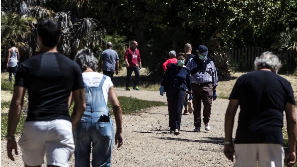 People walk in the park of Villa Pamphili during phase two of the emergency block of the Coronavirus Covid-19 in Rome, Italy, 08 May 2020