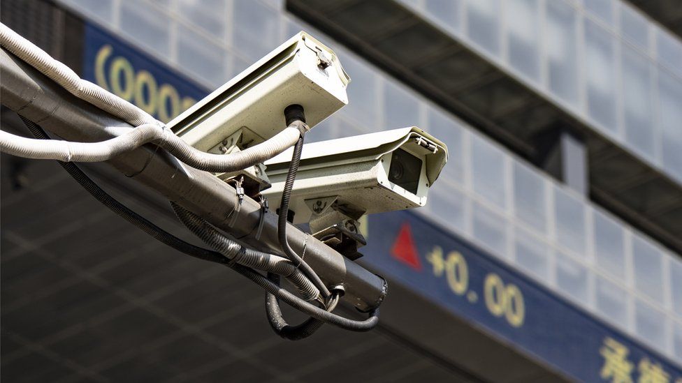 A surveillance camera outside the Shenzhen Stock Exchange building.