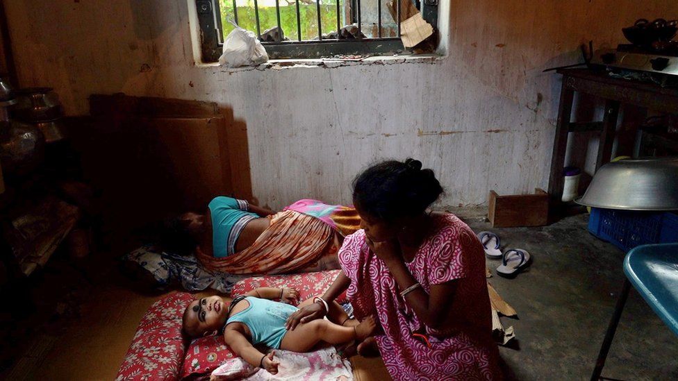 People seen at a shelter in Assam's Silchar