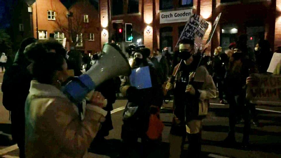 People gathered outside Cardiff Bay police station on Thursday