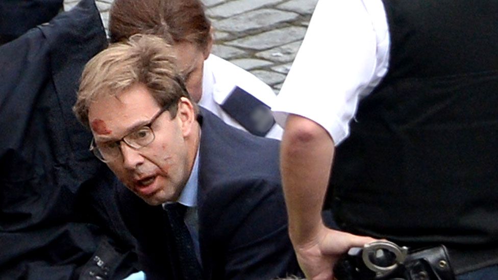 Tobias Ellwood giving CPR to PC Keith Palmer