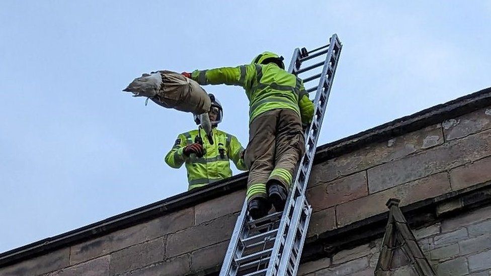 Firefighters at church