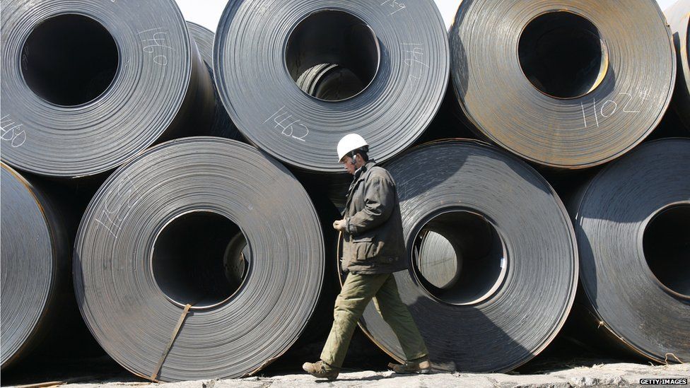 A worker at a steel wholesale market in Liaoning Province, China