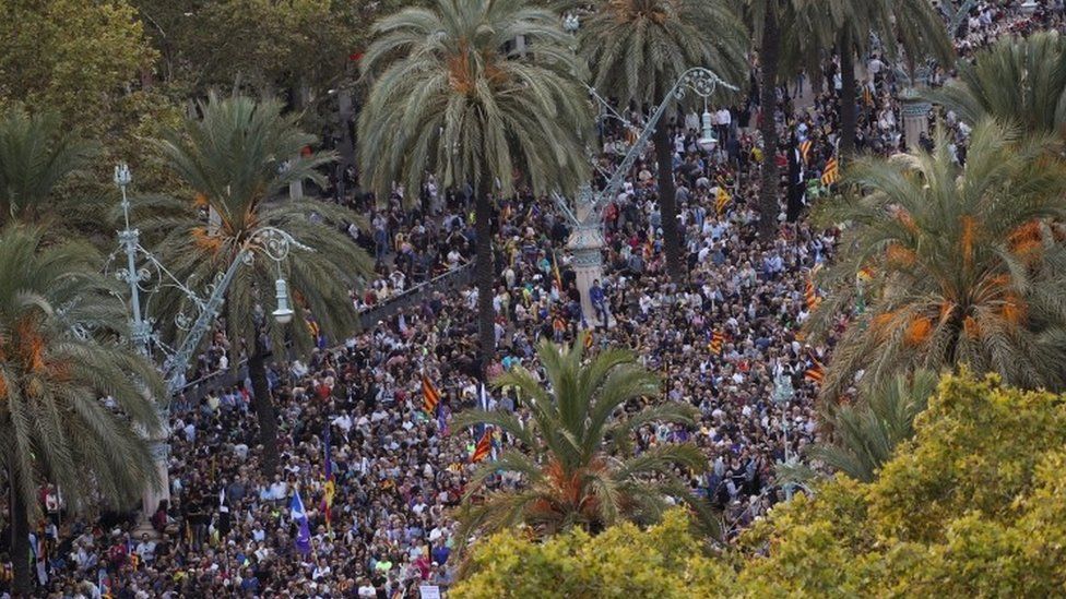 People attend a pro-independence rally near the Catalan regional parliament in Barcelona, Spain October 10, 2017