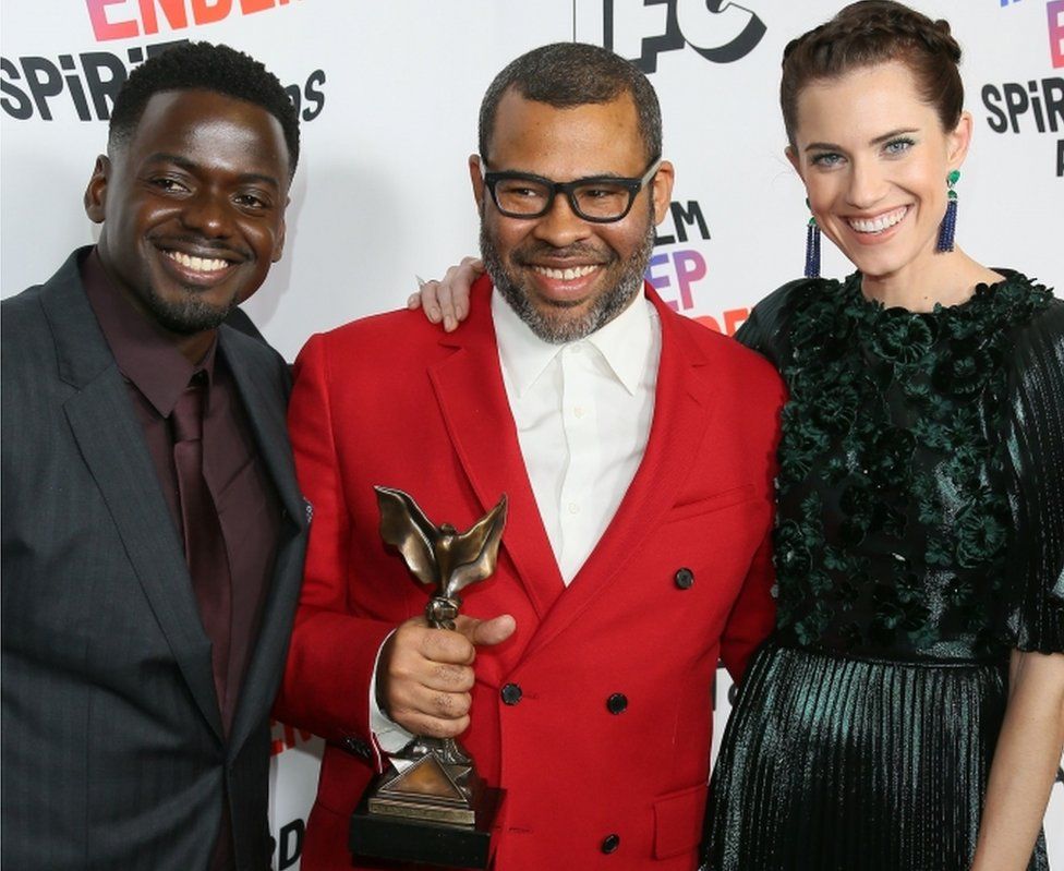 Daniel Kaluuya, Jordan Peele and Allison Williams with the Best Feature Award for Get Out