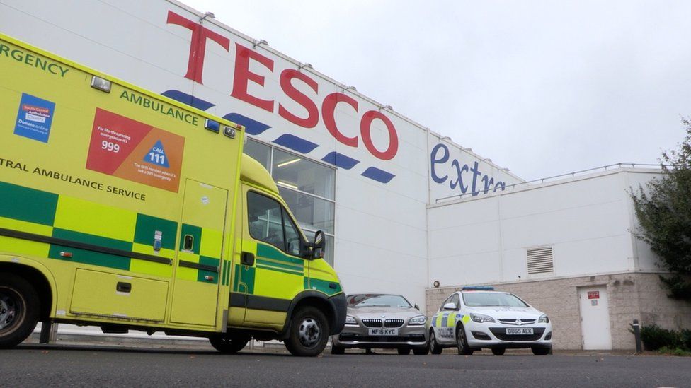 Security Guard In Tesco Extra Reading Roof Protest Bbc News