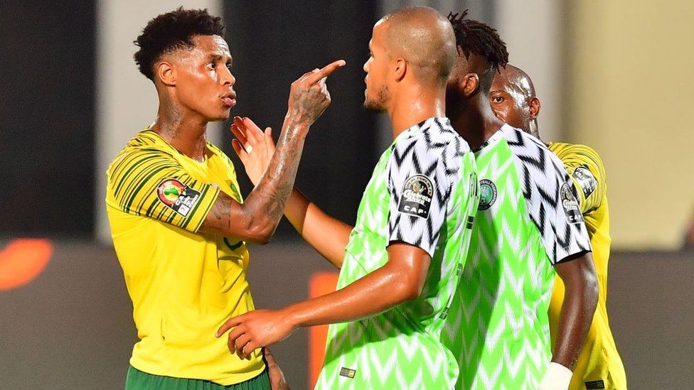 South African midfielder faces up to Nigerian defender William Ekong in a 2019 Africa Cup of Nations game