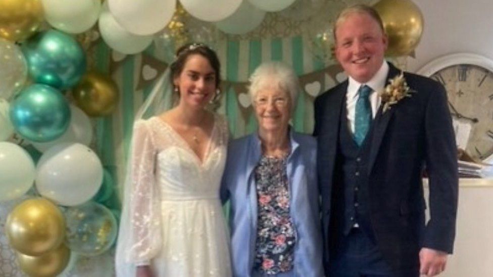 bride, grandmother and groom