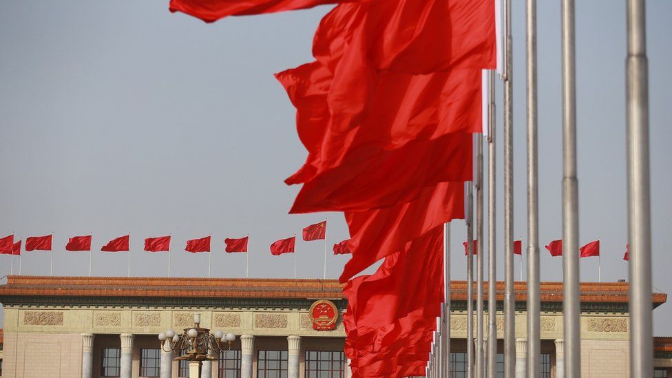 China flags outside the National People's Congress