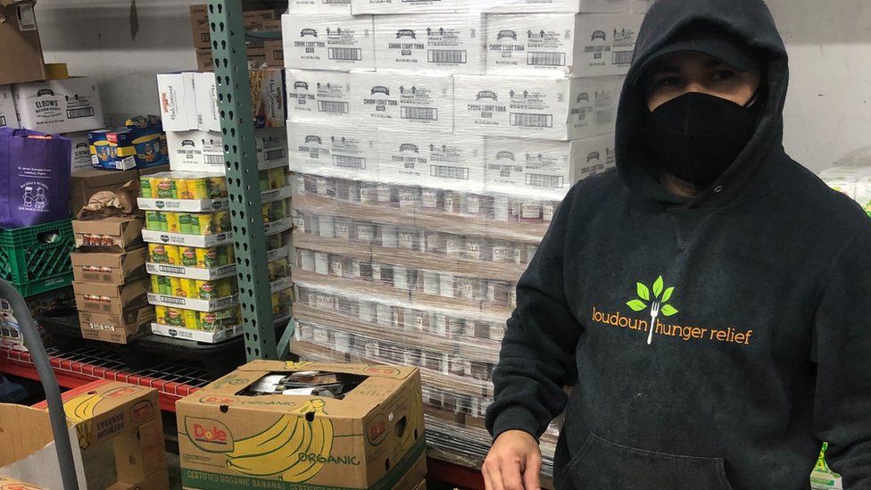 A volunteer helps with Loudoun Hunger Relief
