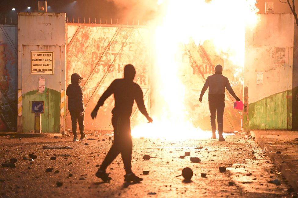 Youths set a fire at the Peace Gate at the Springfield Road/Lanark Way interface on 7 April 2021 in Belfast, Northern Ireland.