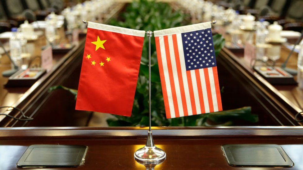 Flags of the US and China are placed ahead of a meeting between US Secretary of Agriculture Sonny Perdue and China's Agriculture Minister Han Changfu at the Ministry of Agriculture in Beijing on June 30, 2017.