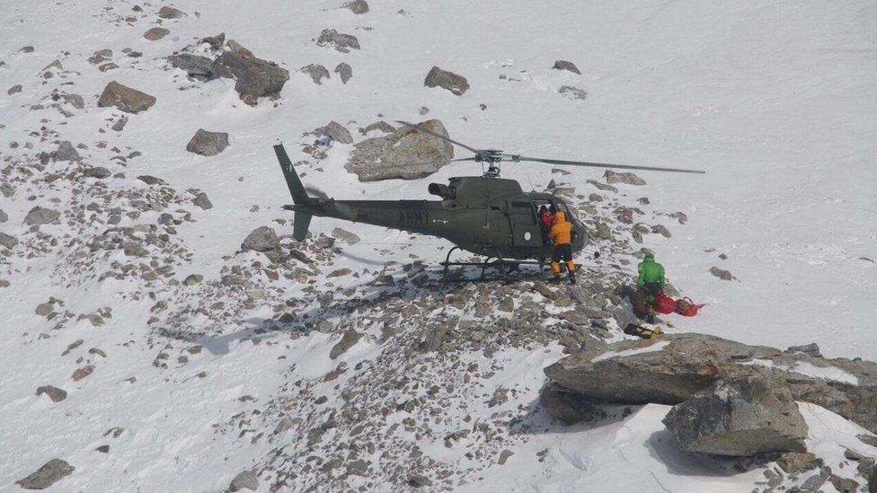 Members of the Polish K2 expedition rescue French climber Elisabeth Revol in Nanga Parbat