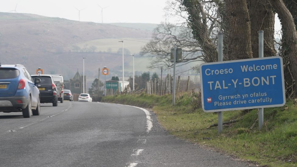 The Tal y Bont sign as you enter the village