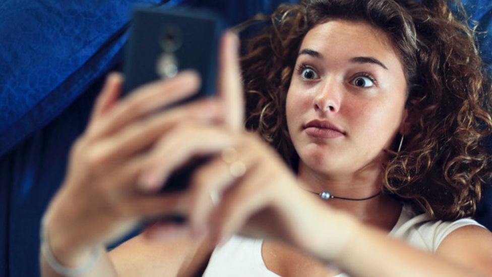 Girl taking a selfie