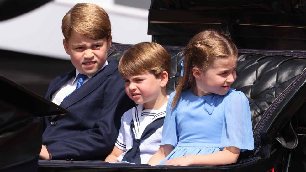 Princes George and Louis, Princess Charlotte, the Duchess of Cambridge and Duchess of Cornwall arriving at Horse Guards' Parade by carriage