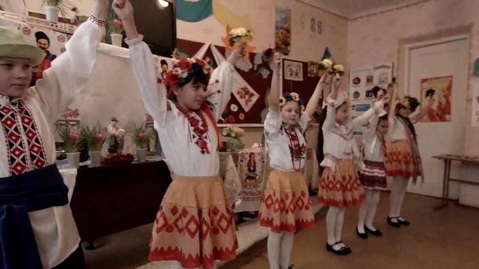 Ukrainian children having music lesson