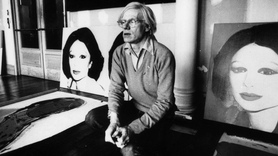 Artist Andy Warhol next to "Princess Of Iran" in 1977