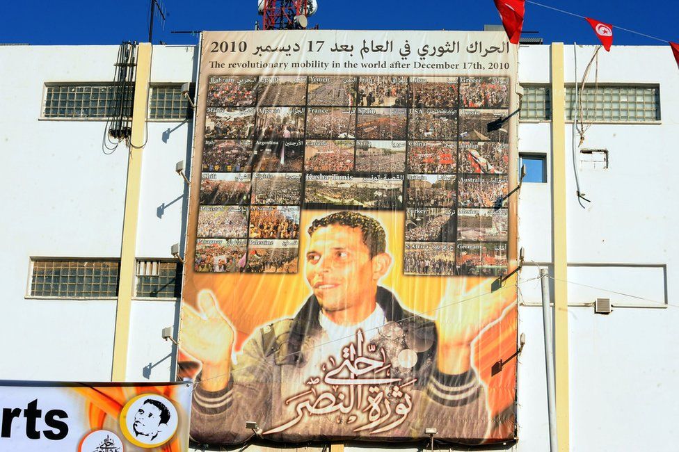 A giant portrait of Tunisian protester Mohamed Bouazizi
